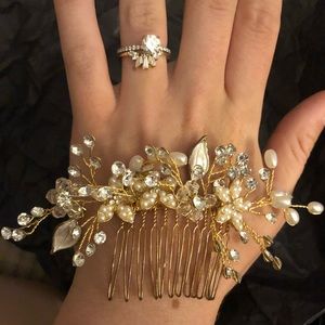 Bridal or formal wear gold and floral hair piece.